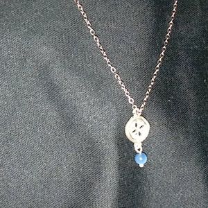 My grandma's little silver sand dollar necklace $9